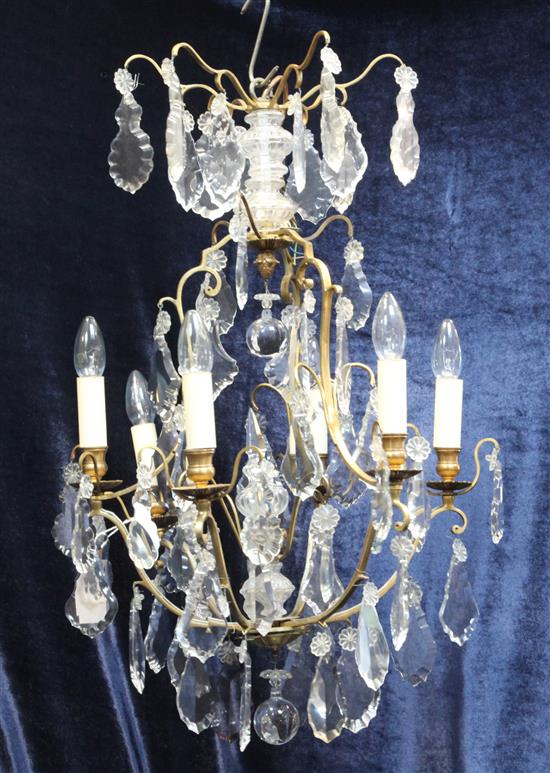 A gilt brass and cut glass six light chandelier, drop 2ft 7in. diam.1ft 6in. approx.
